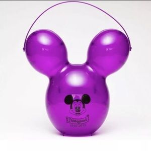 2 purple disney popcorn buckets
